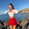 imageOQQ Women 2 Piece Mini Skirts 2 in 1 Flowy Sexy Basic Stretchy Cross Over Flared Casual SkirtsBlack red