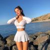 imageOQQ Women 2 Piece Mini Skirts 2 in 1 Flowy Sexy Basic Stretchy Flared Casual SkirtsBlack White